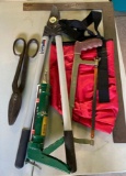 Square, pruning shears, scissors, cocking gun and bag