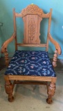 Antique carved wooden arm chair