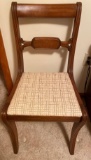 Antique wooden side chair with upholstered seat