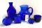 Cobalt blue pitcher, vase, cup and bottles