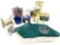 Miniature brass doll bed with doll, vase, flask and misc.