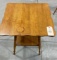 Antique side table with beveled edge top