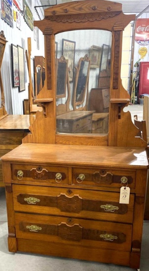 Antique four drawer dresser on casters with mirror