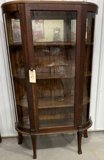 Antique curved front curio cabinet