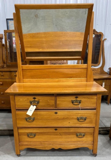 Antique four drawer dresser with mirror on wheels