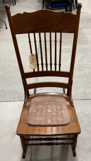 Antique rocker with padded crocheted seat