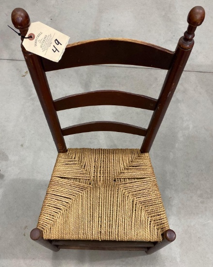 Antique ladder back chair with rope seat