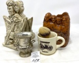 Antique bookends, cup and shaving cream brush