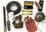 Knife, tire ashtray, rocks, ball jelly lids, Keen cutter chisel and advertising
