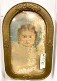 Antique picture of a small girl in bubble glass with gold trim