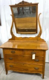 Antique four drawer dresser on casters with mirror