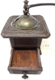 Antique metal coffee grinder with drawer