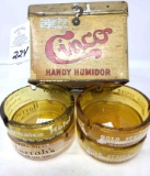 Antique tin Cinco humidor, 4 vintage Nevada ashtrays