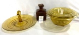 Three vintage Amber bowl set, plate with handle, and bottle