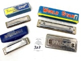 Antique harmonicas some with box