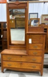Antique gentleman's dresser on wheels