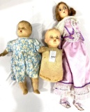 Three antique dolls