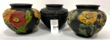 Three vintage black vases