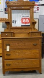Antique five drawer vanity dresser with mirror and on wheels