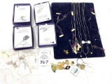 Vintage necklaces, pins and charms