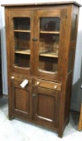 Antique pine flat front cupboard with punched tin sides