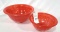 Two vintage red bowls