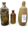 Three alcohol crock bottles (two advertising)