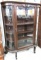 Walnut flat topped curved glass China cabinet