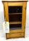 Antique small wooden cabinet with glass door and drawer