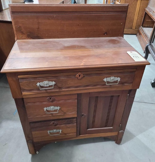 Walnut Commode on casters