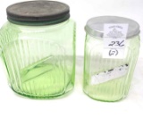 Two green glass cannister jars