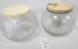 Two round glass cannister jars