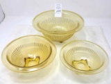 Three light amber nest of bowls