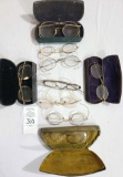 Nine gold rimmed Spectacles/Glasses (4 w/cases)