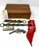 Wooden box, Horner harmonica, toy gun, cowboy scarf, two bridal pieces