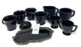 Black amethyst cups, creamers, sugars, and tray