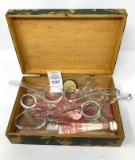 Glass spoons and wooden box