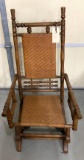 Antique spindle platform rocker with woven seat/back