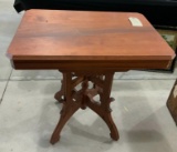 Eastlake type parlor table on casters
