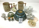 Doll size tea set, paperweight, Frankoma road runner mugs, September angel, and jewelry music box
