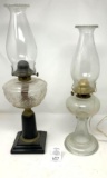 Two oil lamps, one electrified
