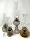 Four oil lamps