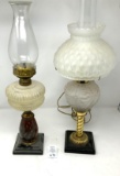 Two oil lamps, one electrified