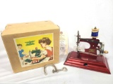 Casige miniature sewing machine in box