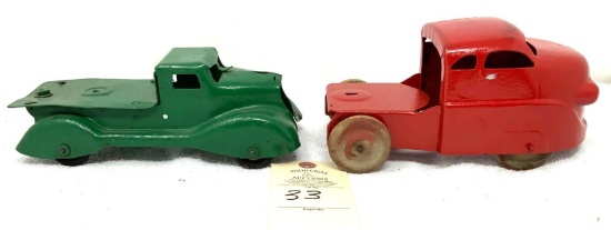 Two antique painted trucks
