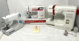 Three plastic mini sewing machines