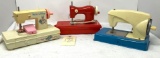 Three Vintage plastic handcrank child size sewing machines