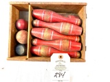 Vintage wooden bowling pins and balls