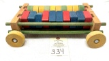 Vintage wooden wagon and blocks