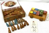 Vintage wooden bowling pins and blocks